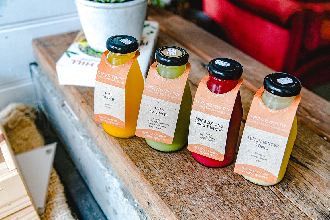 Pure and Healthy juices on table